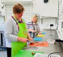 Spring Northampton. Women preparing food in the kitchen