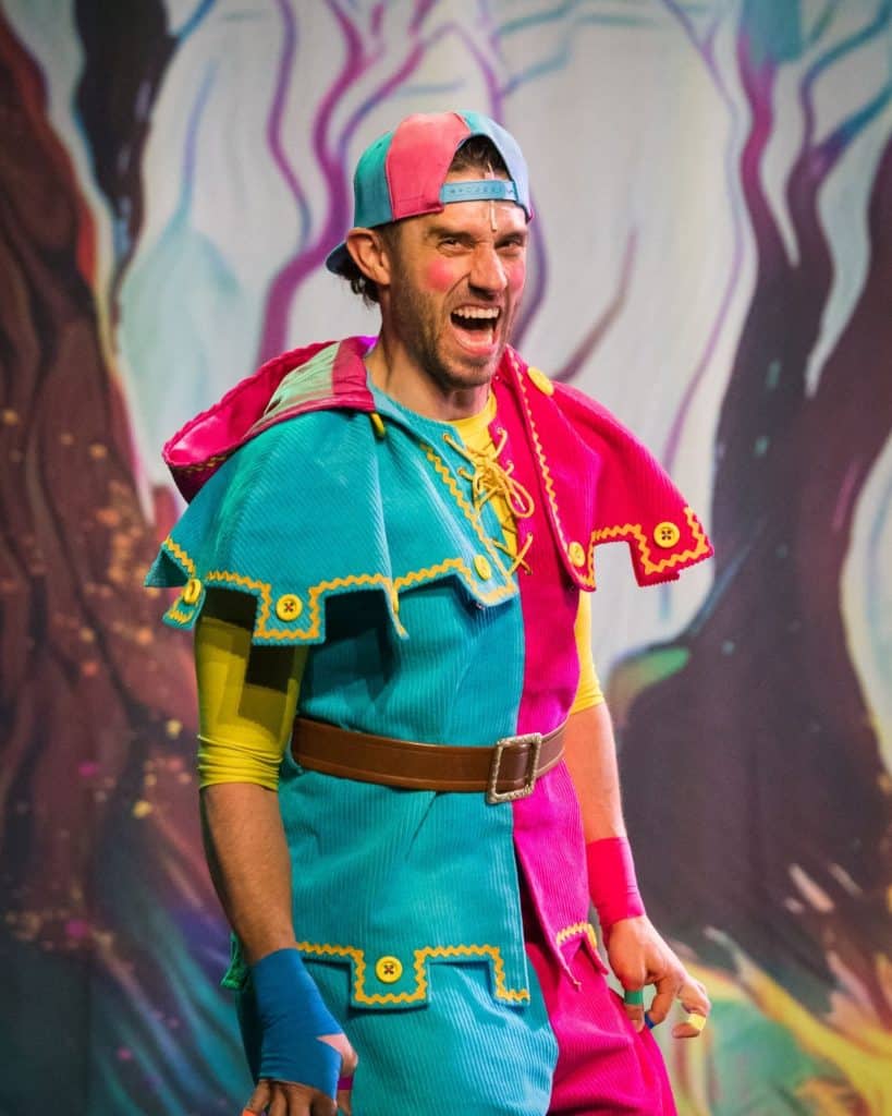 Silly Billy character in colourful costume at Robin Hood Easter panto