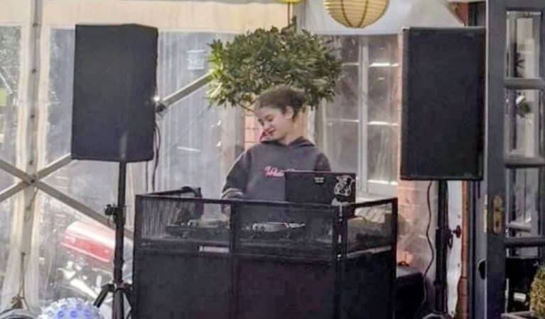 Child DJ at decks performing at the Sun Inn Hardingstone kids party.