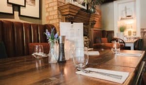 Table and menu at The Sun Inn Hardingstone