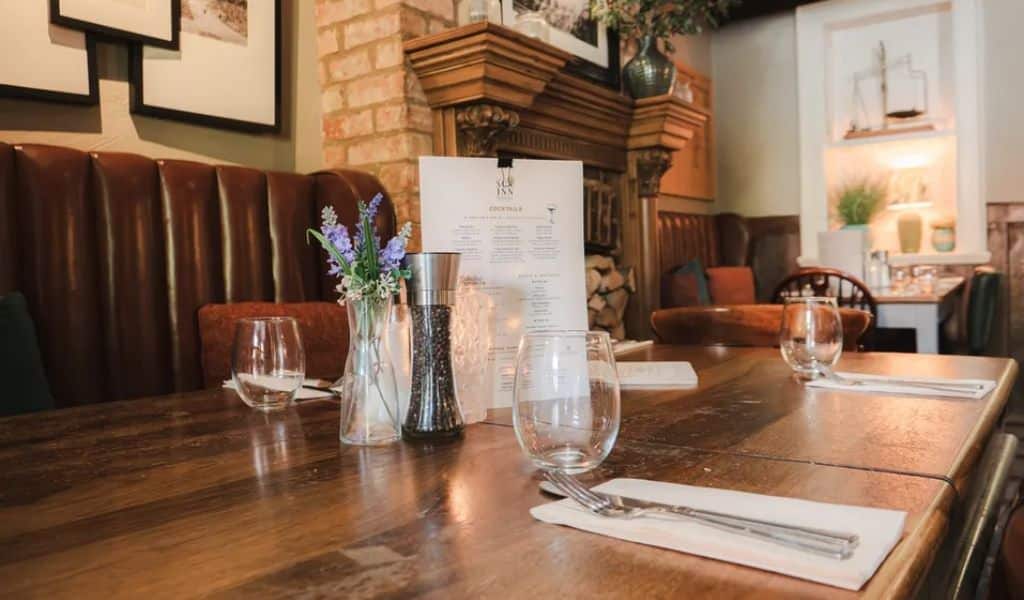 Table and menu at The Sun Inn Hardingstone
