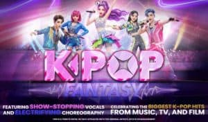KPop Fantasy promotional poster showing five animated K-pop performers in colourful stage outfits holding microphones, with pink and blue neon "KPOP FANTASY" logo text and the caption noting it's a tribute show not affiliated with the original artists, estate or management.