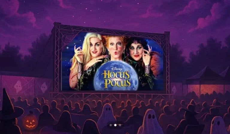 The 3 witches from the Hocus Pocus movies on an outdoor cinema screen in front of an audience of ghoats