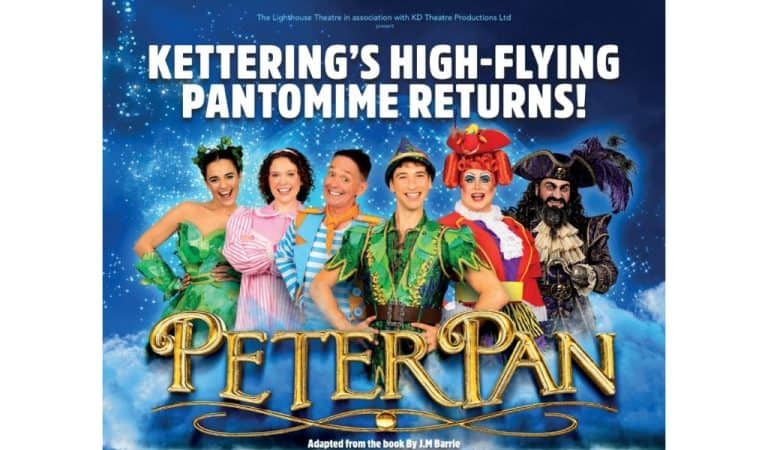 Six pantomime cast members in colourful costumes, including a green-clad Peter Pan and a pirate captain, against a starry blue sky with the gold Peter Pan title